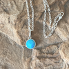 Pendants, Opal Reverses to Zia Symbol Round in Sterling - Gloria Sawin  Fine Jewelry 